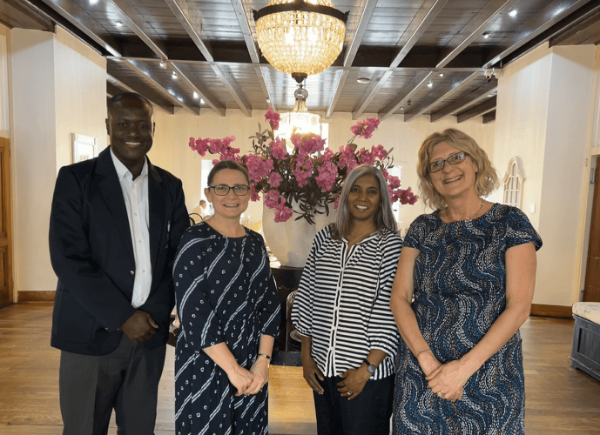 Sarah Earle and Sarah Hayes pose with colleagues from Wits University