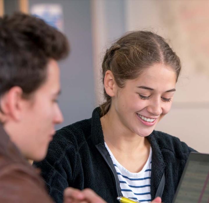 Two students at a table